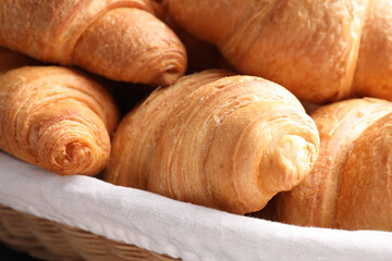 Closeup view of tasty fresh crispy croissants