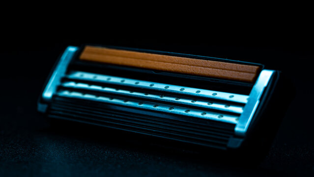 recommend clip art: replacement razor head for shaver isolated on black background