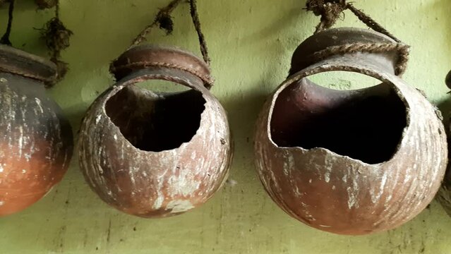 Pigeon's nest. This nest is made from clay
 pots. Indian traditional Pigeon's nest. Pigeons home. Bird's nest in India. 
