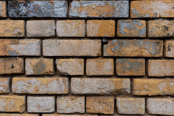 Old wall of bricks or Stones and fugues