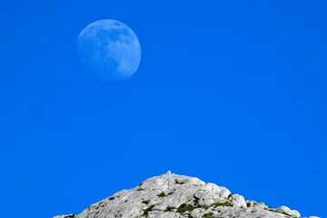 Fototapeten zunehmender Mond // waxing moon (11.06.2022, 17.30 Uhr) - Lovcen Nationalpark, Montenegro © bennytrapp