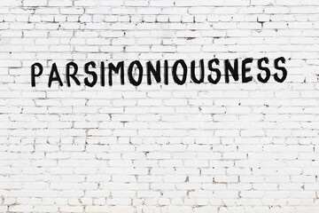 Neon sign. Word parsimoniousness against brick wall. Night view - obrazy, fototapety, plakaty