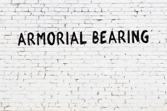 Neon Sign. Word Armorial Bearing Against Brick Wall. Night View