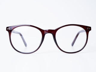 Corrective glasses in a brown plastic frame