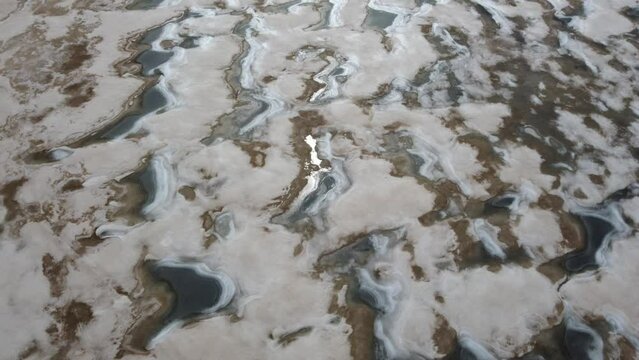 High mountain frozen lake