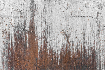 White paint abstract pattern on the surface of an old rusty metallic texture steel background rust brown