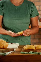 Woman hands holding brazilian snacks beef stufing croquette (risolis de carne)