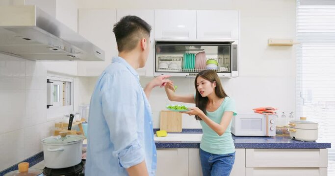 couple cooking have conflict