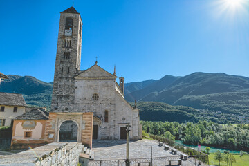 Fototapeta na wymiar Crevoladossola at the foot of the Alps in Piedmont, on the Sempione road in val d'Ossola, Italy, with the church of Saints Peter and Paul built in 1331 with changes up to XVI century