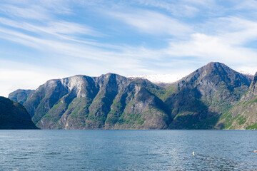 Impressive fjord Naeroyfjord as it passes through Aurland, Norway