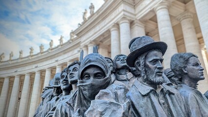 Closeup of the statue honoring migrants and refugees in St. Peter's Square at the Vatican in Rome - obrazy, fototapety, plakaty
