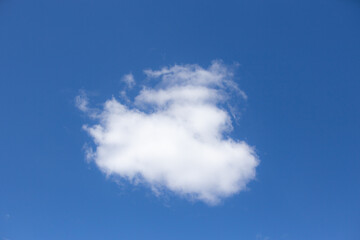 White cloud with cotton texture isolated on blue sky background