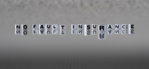 no fault insurance word or concept represented by black and white letter cubes on a grey horizon...