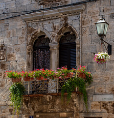 Fototapeta na wymiar Balcony on a medieval building, Vodnjan, Istra County, Croatia