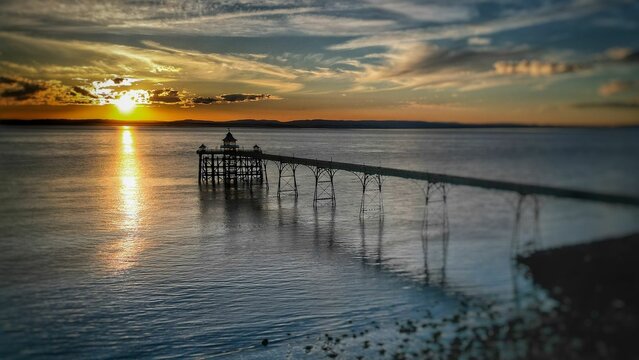 Beautiful shot of the Clevedon Pier under a sunset sky