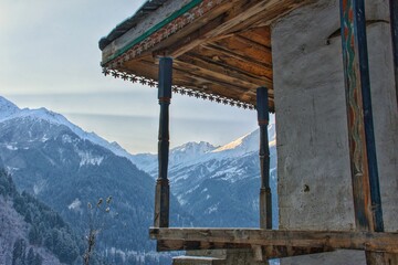 View from a wooden balcony of the Tosh Parvati Valley in Himachal Pradesh, India - obrazy, fototapety, plakaty