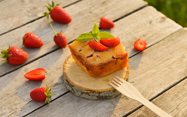 Delicious summer dessert strawberry pie, sweet delicious festive cake with strawberries on a round stand