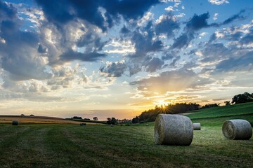 bale of straw in sunset