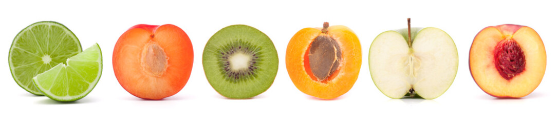 Creative layout made of sliced lime, plum, kiwi, apricot, apple, peach. Food concept. Fruits...