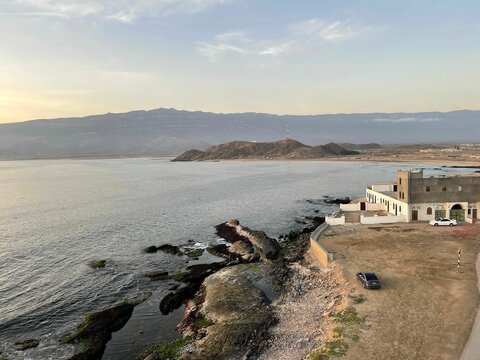Aerial view of a beautiful seascape in cloudy sky background in Mirbat, Oman