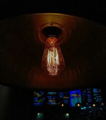Vertical shot of a lamp in a chandelier
