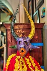 Vertical shot of a traditional Puerto Rican Vejigante mask