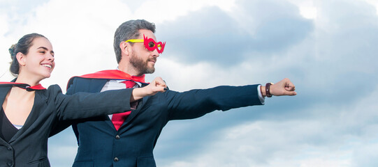 business people in superhero suit on sky background. Horizontal poster design. Web banner header, copy space. © Olena
