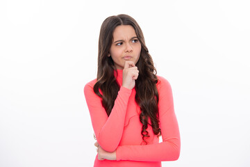 Thoughtful teenager girl touch chin and thinking, pensive child making idea, posing isolated on white studio background. Thinking face, thoughtful emotions of teenager girl.