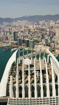 Verticle aerial shot of Hong Kong skyline surrounding the iconic building IFC