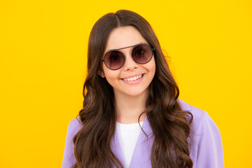 Headshot portrait of teenager child girl isolated on studio background. Childhood lifestyle concept. Mock up copy space.