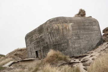 Bunker sinking in the sand on the beach