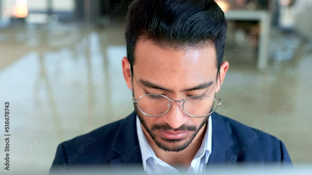 Leinwandbilder focused male copywriter writing a script using a computer inside an office. serious and professional