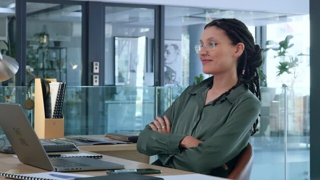 Female digital specialist satisfied with the good feedback received on a project via email. Happy marketing analyst looking at report on a laptop and feeling confident with the results.