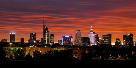 Warsaw, Poland - 14.07.2022: City panorama, Warsaw skyline with at beautiful sunset clouds. - obrazy, fototapety, plakaty