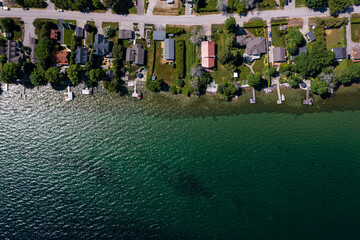wassage beach looking down at shoreline water and houses in view 