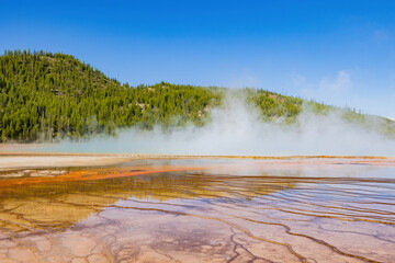 Sunny view of beautiful landscape along Grand Prismatic Spring