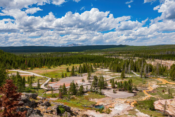 Fototapeta na wymiar Sunny view of the landscape around Artists Paintpots in Yellowstone National Park