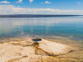 Sunny beautiful landscape of the Big Cone of West Thumb in Yellowstone National Park