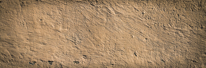 Texture of painted concrete wall. Rough cement surface. Panoramic background for grunge design.