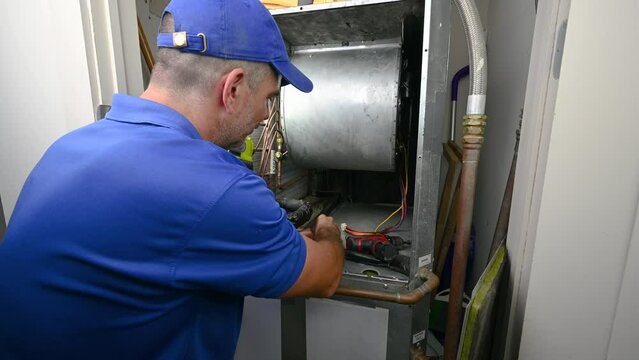 HVAC Technician Hooking up a Blower Motor
