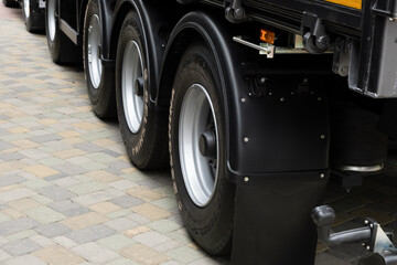 View on truck wheels and tires on truck chassis. Truck wheel rim. Truck chassis parts details devices equipment.