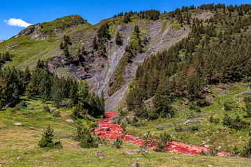 red river between Pyrenean mountains