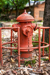 Close-up of an old fire hydrant in an industrial area