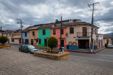 San Cristóbal de las Casas, Mexico. Street perspective in San Cristobal, a historic highland town with colourful colonial architecture and narrow cobblestone streets in southern Mexico.