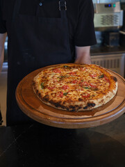 a pizza fresh out of the oven