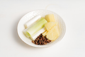 Home-cooked meat stew seasoning on a solid background