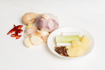 Home-cooked meat stew seasoning on a solid background