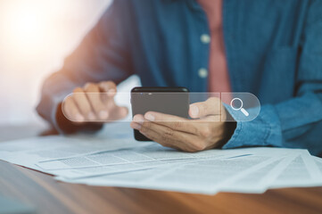 Fototapeta premium Man using smartphone search on internet mobile