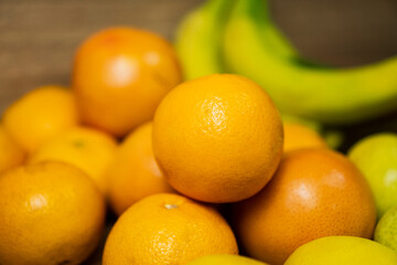 Orange on a bed of fruits and vegetables