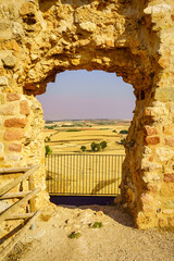 Arch-shaped door overlooking the outside of the wall of the castle of San Esteban de Gormaz, Soria.
